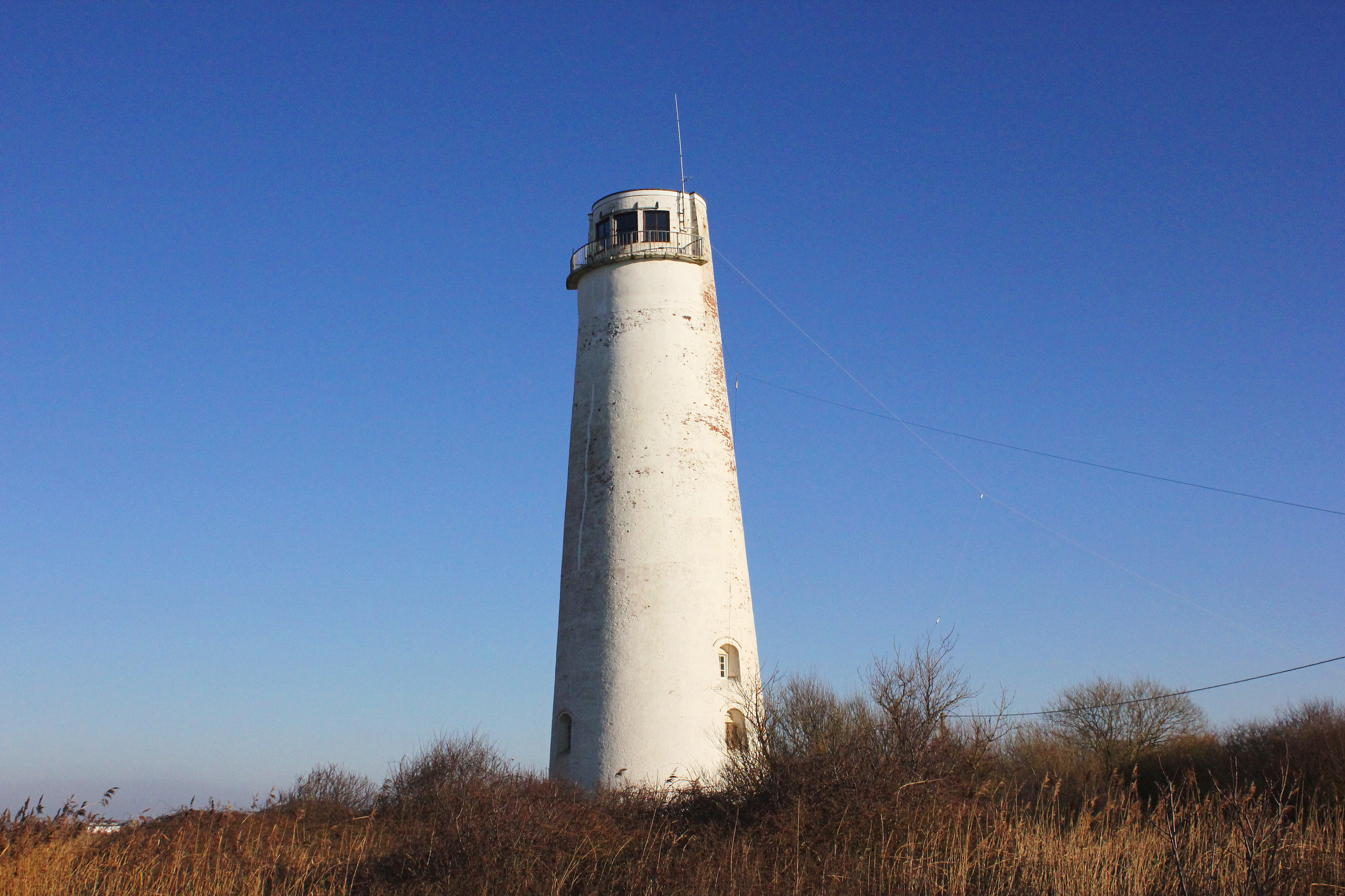 Leasowe Lighthouse under a blue sky on the North Wirral coast