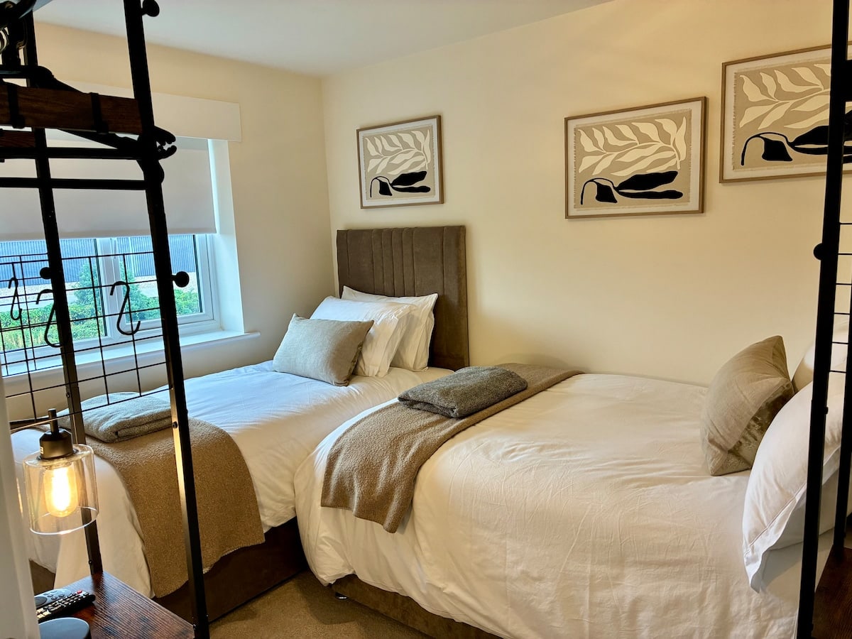 Bedroom 2 at Fairwater House with two beds