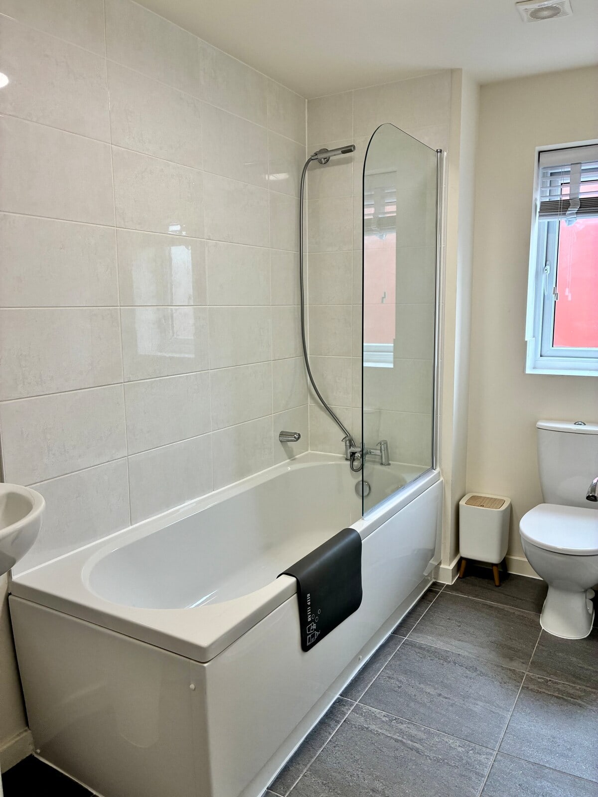 Family bathroom with bath and shower at Fairwater House