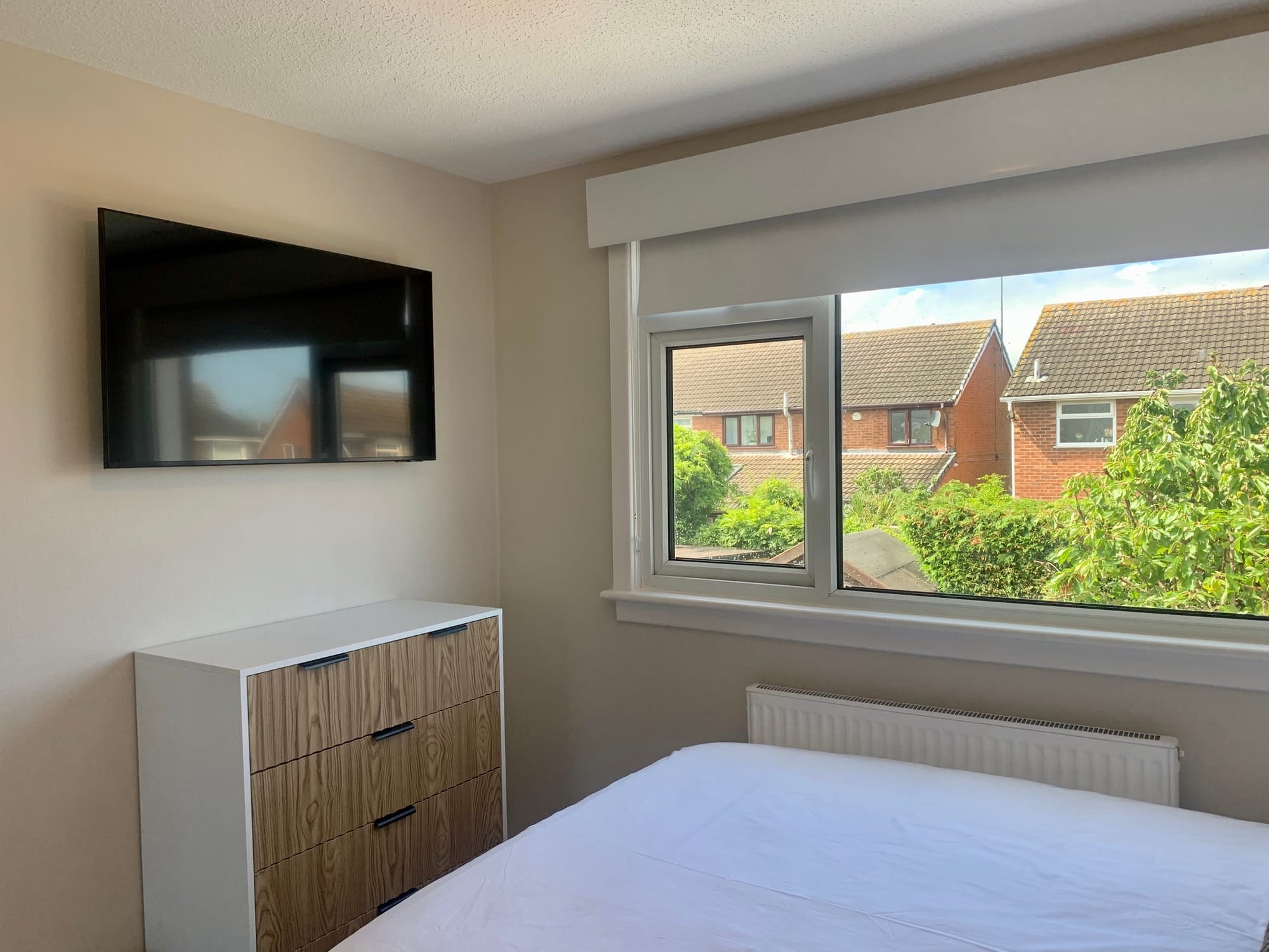 Kingfisher Nest bedroom with TV and window