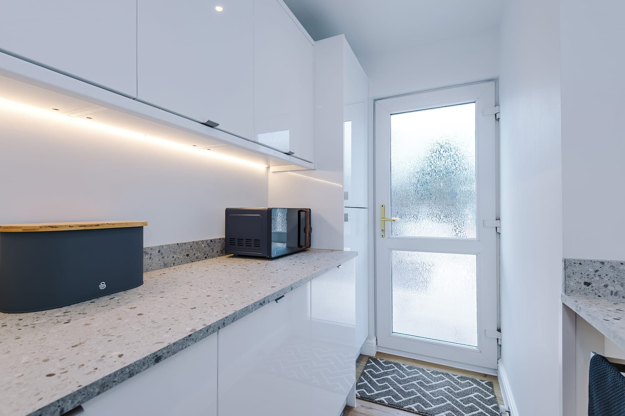 Patricia Place kitchen with microwave